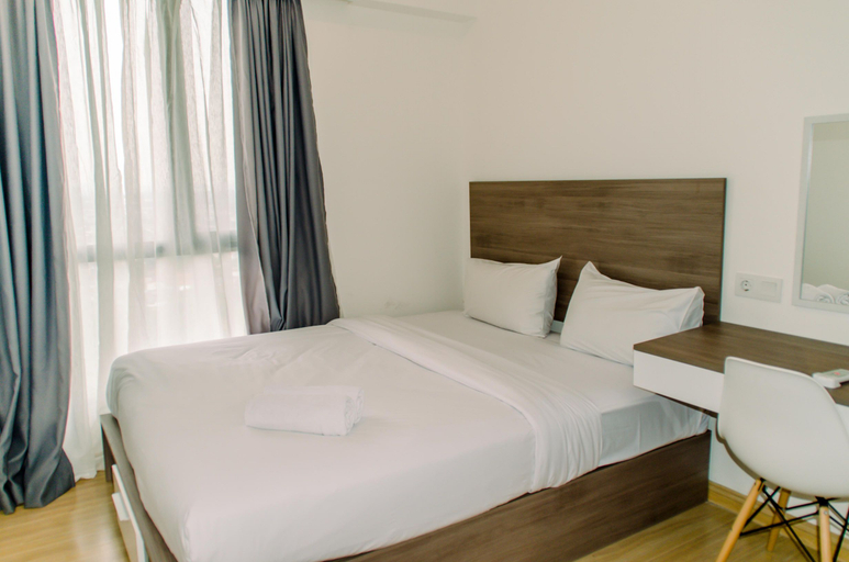 Bedroom 1, Elegant and Tidy 2BR at Sky House BSD Apartment By Travelio, South Tangerang
