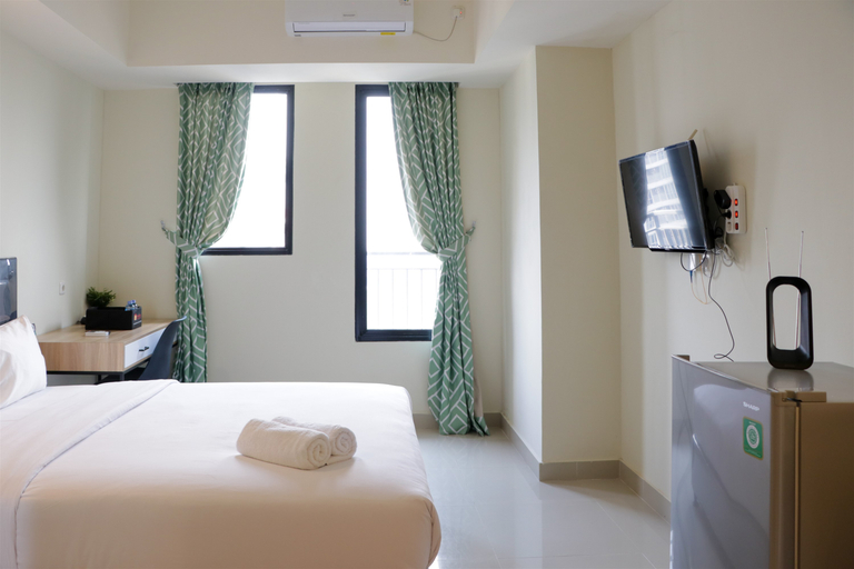Bedroom 3, Comfortable and Strategic Studio Apartment Evenciio Margonda By Travelio, Depok