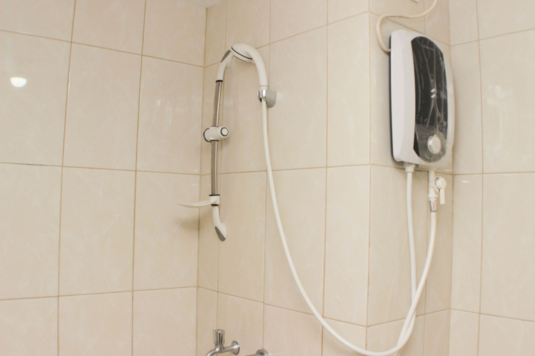 Bathroom 5, Great Location Studio Room at Springlake Summarecon Bekasi Apartment By Travelio, Bekasi