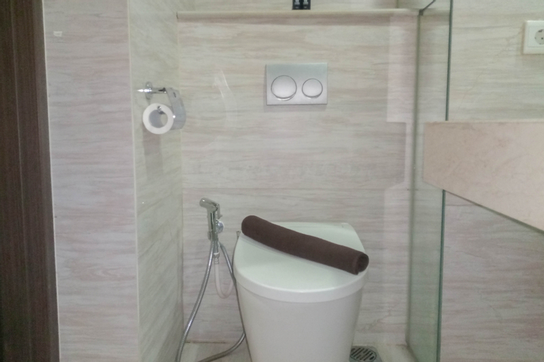 Bedroom 2, Elegant and Comfortable 1BR at Uttara The Icon Apartment By Travelio, Sleman