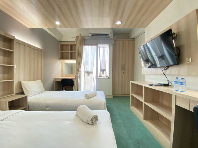 Bedroom 2, Beauty Studio (No Kitchen) at Harvard Jatinangor Apartment By Travelio, Sumedang