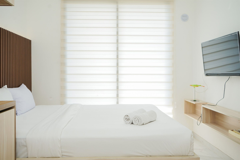 Bedroom 3, Comfy and Minimalist Studio at Sky House BSD Apartment By Travelio, Tangerang Selatan