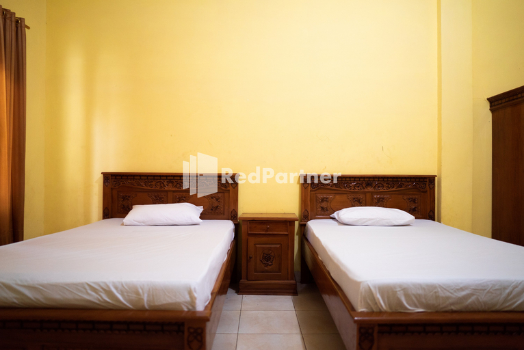 Bedroom 2, Wisma Citra Metro Mitra RedDoorz, Metro