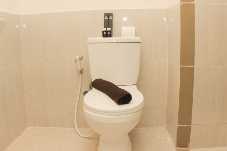 Bathroom 5, Simple and Comfort 2BR at Meikarta Apartment By Travelio, Cikarang
