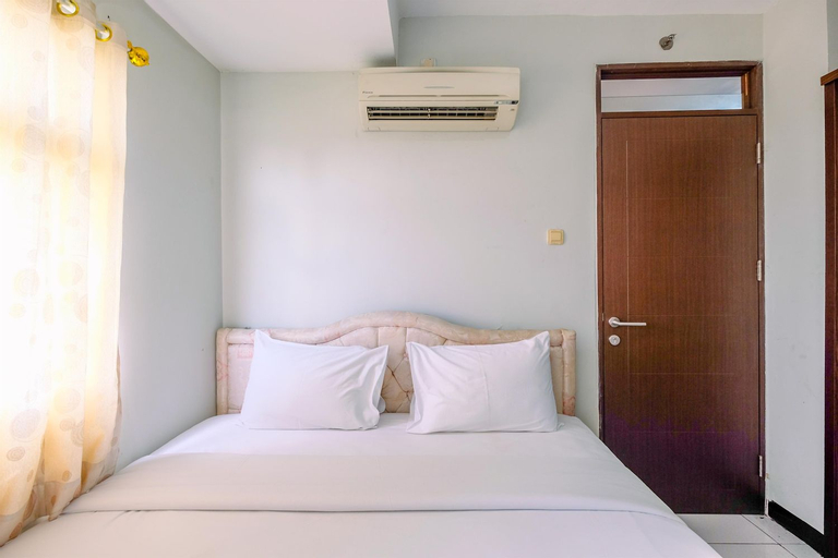 Bedroom 1, Comfort 2BR at Bekasi Town Square Apartment By Travelio, Bekasi