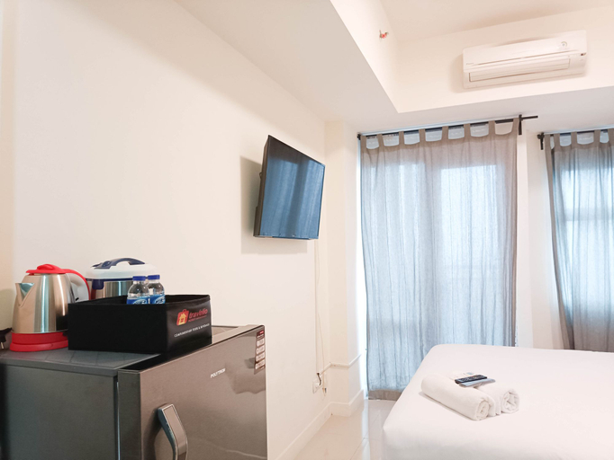 Bedroom 4, Cozy and High Floor Studio Room at Vida View Makassar Apartment By Travelio, Makassar