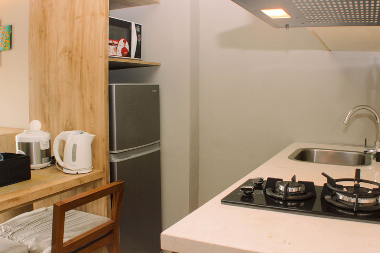 Others 3, Stunning and Comfortable 1BR Apartment Mustika Golf Residence By Travelio, Cikarang