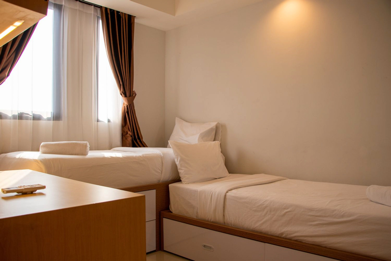Modern and Classic 1BR at Evenciio Apartment By Travelio, Depok