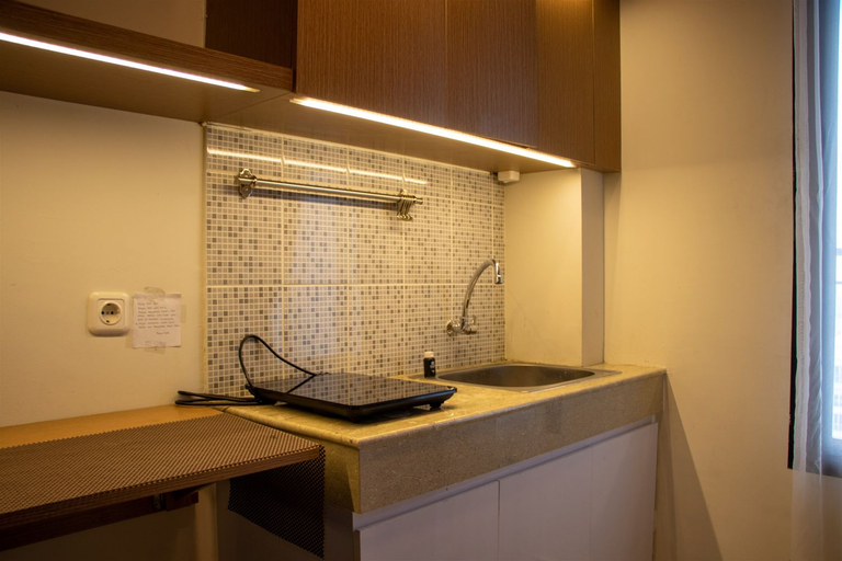 Others 2, Modern and Classic 1BR at Evenciio Apartment By Travelio, Depok