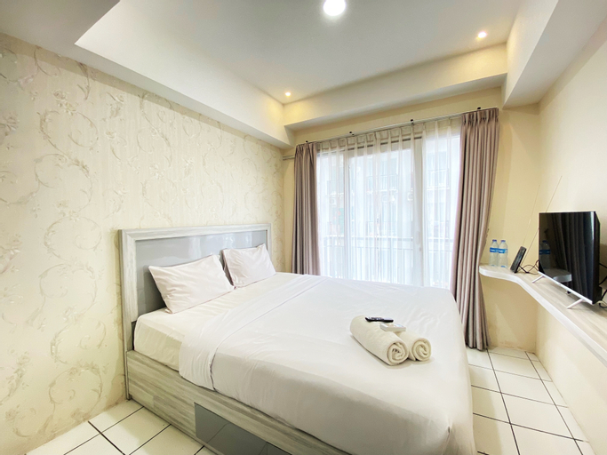 Bedroom 1, Comfy Studio Room at Grand Asia Afrika Apartment By Travelio, Bandung