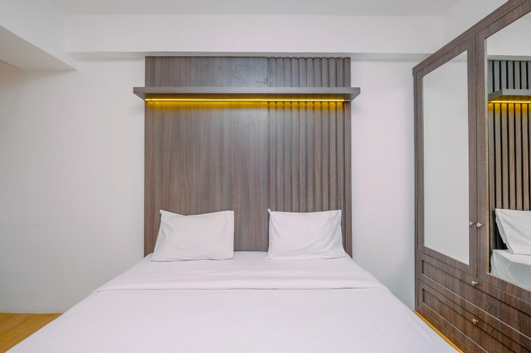 Bedroom 1, Minimalist and Warm Studio at Gunung Putri Square Apartment By Travelio, Bogor