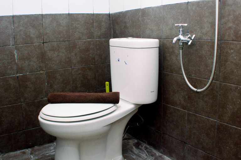 Bathroom 5, Nice and Strategic 2BR at Green Pramuka City Apartment By Travelio, Central Jakarta