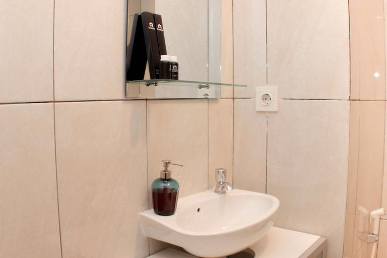 Bedroom 2, Warm and Cozy Studio at Grand Kamala Lagoon Apartment By Travelio, Bekasi