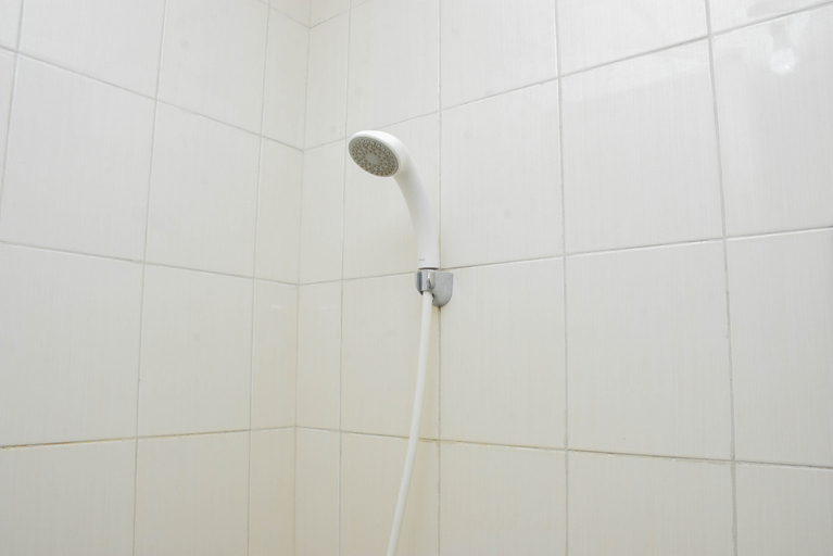 Bathroom 5, Stunning and Comfy Studio at Signature Park Grande Apartment By Travelio, East Jakarta