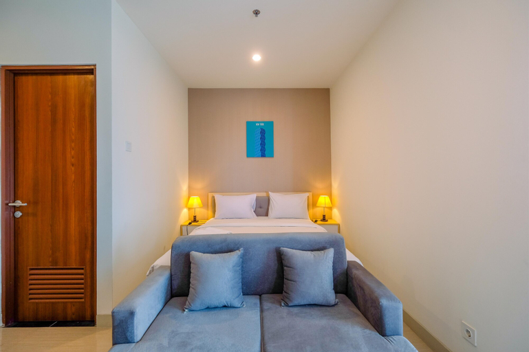 Cozy and Great Choice Studio at Grand Kamala Lagoon Apartment By Travelio, Bekasi
