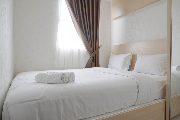 Bedroom 2, Comfort and Warm 2BR at Parkland Avenue Apartment By Travelio, South Tangerang
