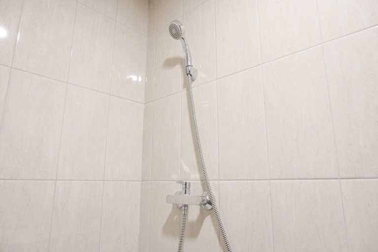 Bathroom 5, Comfy and Nice Studio Apartment at Citra Living By Travelio, West Jakarta