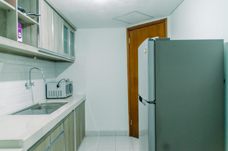 Others 4, Spacious 3BR at Kondominium Golf Karawaci Apartment By Travelio, Tangerang