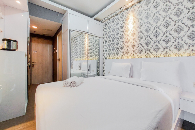 Bedroom 1, Modern Look Studio Apartment at Akasa Pure Living BSD By Travelio, South Tangerang