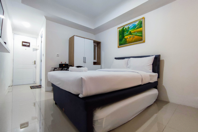 Bedroom 1, Comfort and Well Design Studio at Paltrow City Apartment By Travelio, Semarang