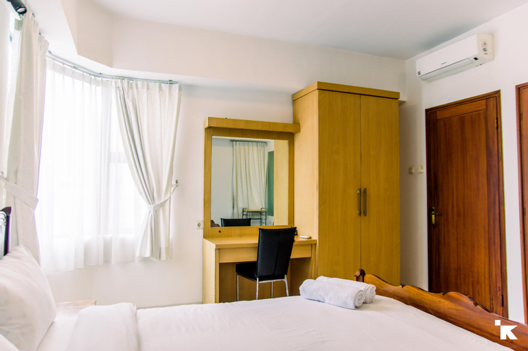 Bedroom 4, Elegant 2BR Apartment at Sudirman Tower Condominium By Travelio, South Jakarta