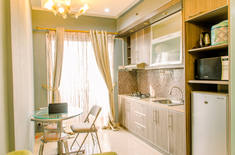 Dining Room 1, Comfortable and Minimalist 2BR at Marina Ancol Apartment By Travelio, Jakarta Utara