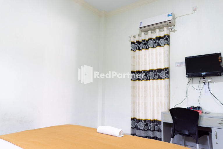 Wisma Aini Syariah Lampung Mitra RedDoorz - Tap to explore photos
