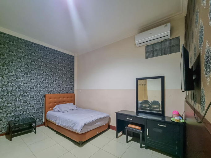 Bedroom 4, Hotel Halmahera Palangkaraya Mitra RedDoorz, Palangkaraya