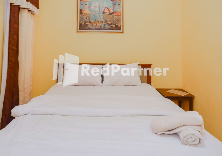 MS Hotel Pangandaran Mitra RedDoorz - Tap to explore photos