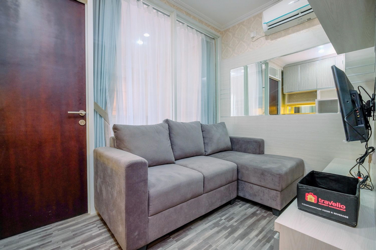 Elegant and Comfortable 1BR Apartment at Atlanta Residences By Travelio, Depok