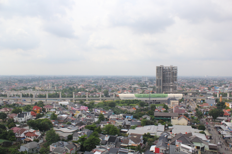 Exterior & Views 3, Cozy Living Studio Room at Grand Icon Caman Apartment By Travelio, Bekasi