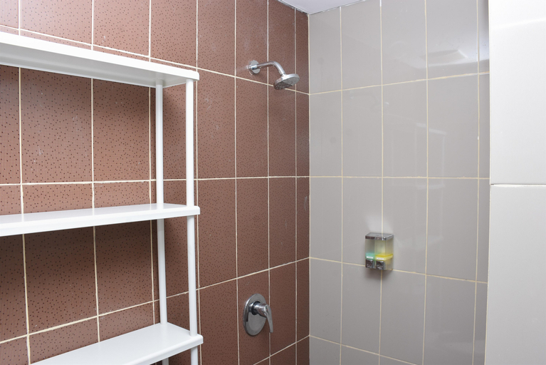 Bedroom 1, Comfort and Simply 1BR Apartment at Atlanta Residences By Travelio, Depok