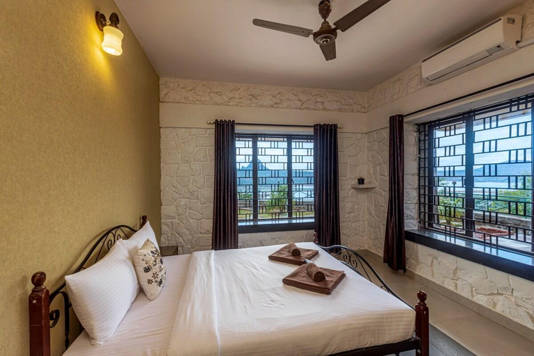Bedroom 3, SaffronStays Blue Infinitum, Pune