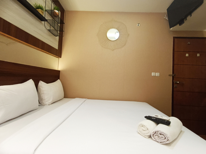 Bedroom 3, Comfort and Strategic 2BR Apartment at Vida View Makassar By Travelio, Makassar