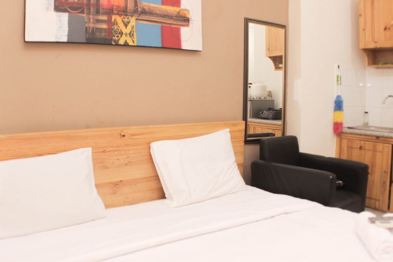 Bedroom 4, Warm and Cozy Studio at Grand Center Point Apartment By Travelio, Bekasi