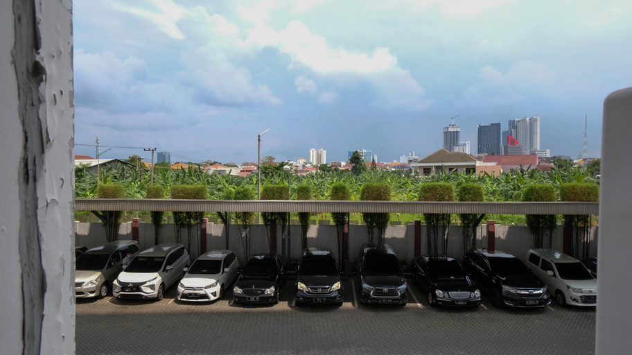 Others 5, Relaxing and Comfy Designed 2BR at Puncak Permai Apartment By Travelio, Surabaya