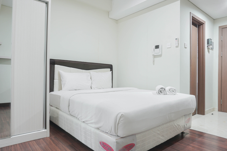 Bedroom 1, Gorgeous and Strategic Studio Puri Orchard Apartment By Travelio, West Jakarta