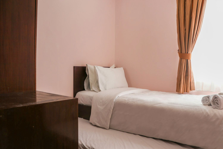 Bedroom 2, Strategic and Comfort Stay 2BR at Sudirman Park Apartment By Travelio, Central Jakarta