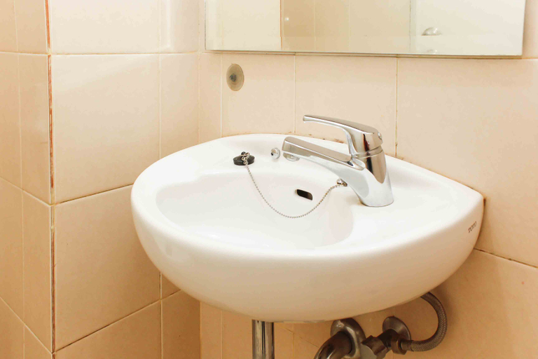 Bathroom 5, Best Choice and Comfy Studio at Gading Greenhill Apartment By Travelio, North Jakarta