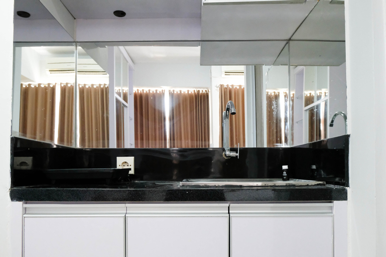 Bedroom 2, Relaxing Studio with Suramadu Bridge View at Taman Melati Surabaya Apartment By Travelio, Surabaya