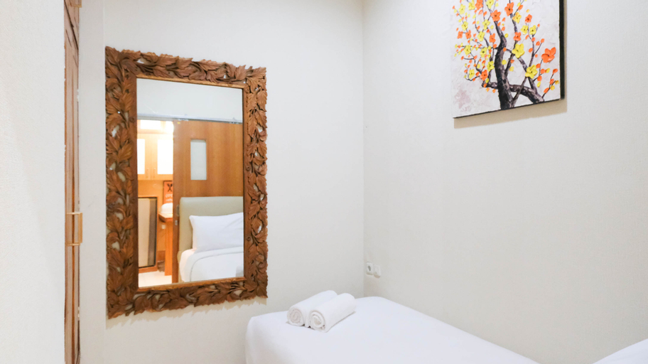 Bedroom 2, Relaxing and Comfy Designed 2BR at Puncak Permai Apartment By Travelio, Surabaya