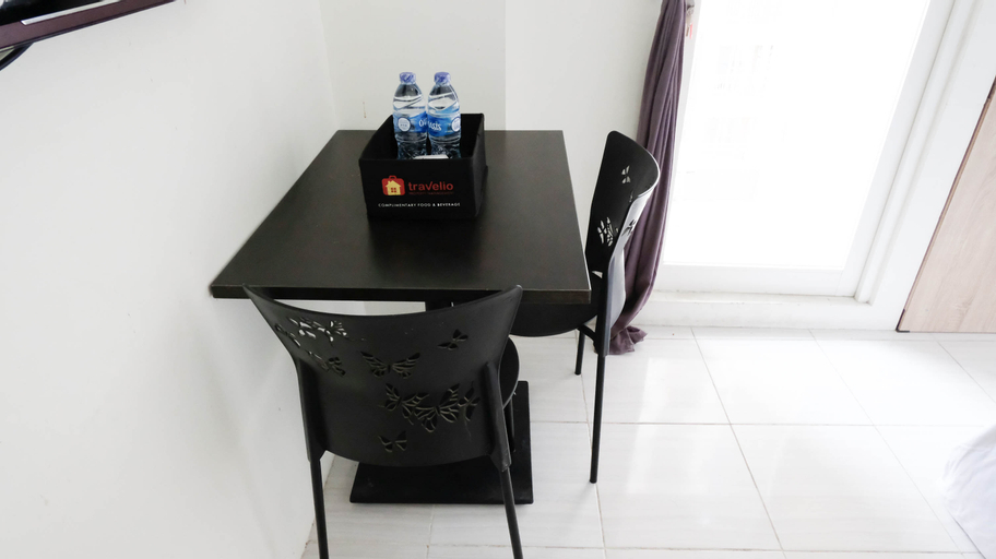 Others, Clean and Cozy Stay Studio at Puncak Dharmahusada Apartment By Travelio, Surabaya