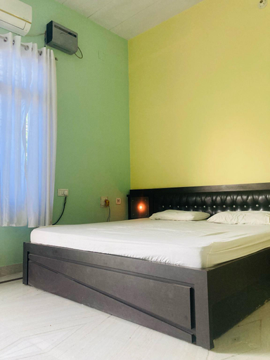 Bedroom 1, The Palm Villa, Varanasi