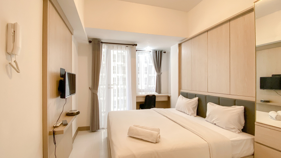 Bedroom 2, Simply Studio Room at Tokyo Riverside PIK 2 Apartment By Travelio, Tangerang