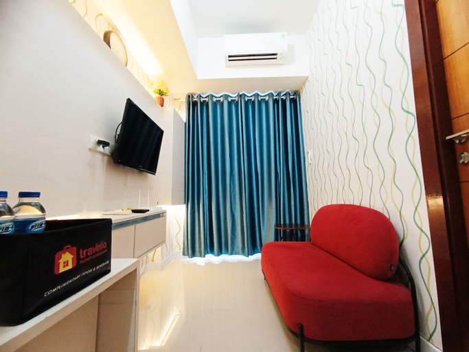 Good Deal and Comfy 1BR Vida View Apartment By Travelio, Makassar