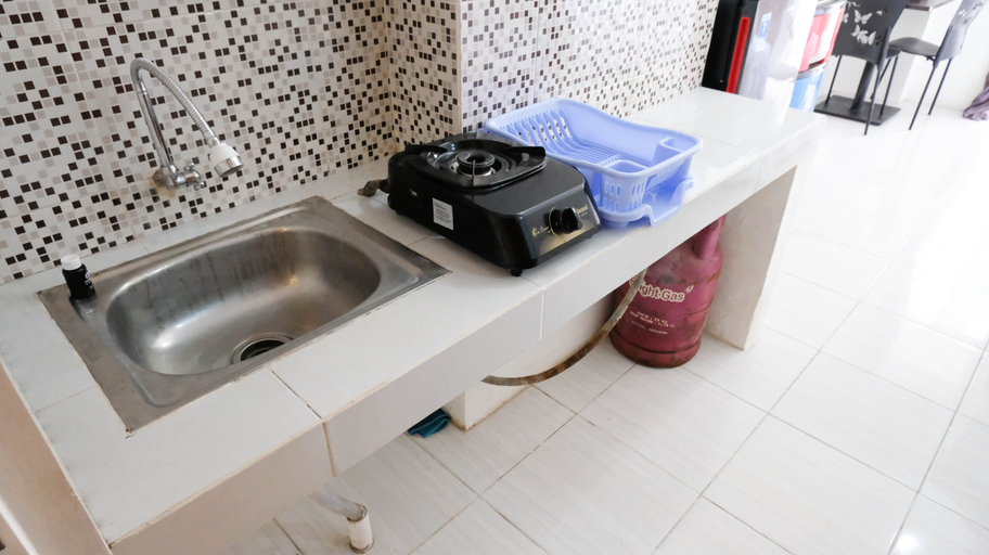 Others 4, Clean and Cozy Stay Studio at Puncak Dharmahusada Apartment By Travelio, Surabaya