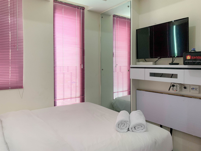 Bedroom 1, Homey and Compact Studio Apartment Osaka Riverview PIK 2 By Travelio, Tangerang