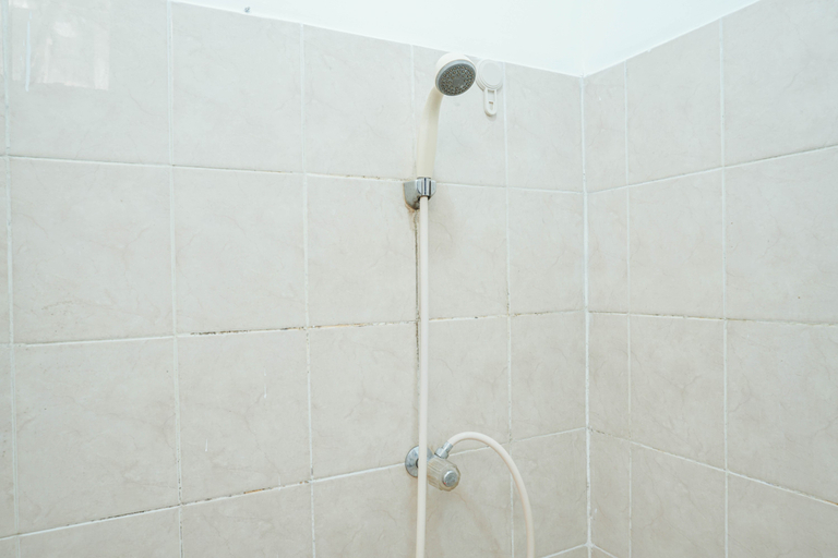 Bathroom 5, Cozy and Simply Studio Green Bay Pluit Apartment By Travelio, Jakarta Utara