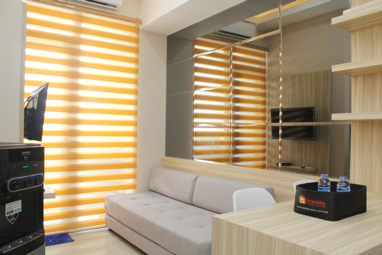 Elegant and Strategic 1BR Vasanta Innopark Apartment By Travelio, Cikarang
