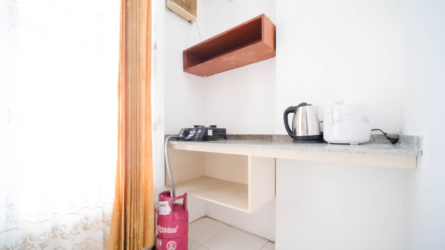 Bedroom 4, Homey Studio Apartment at Dian Regency By Travelio, Surabaya
